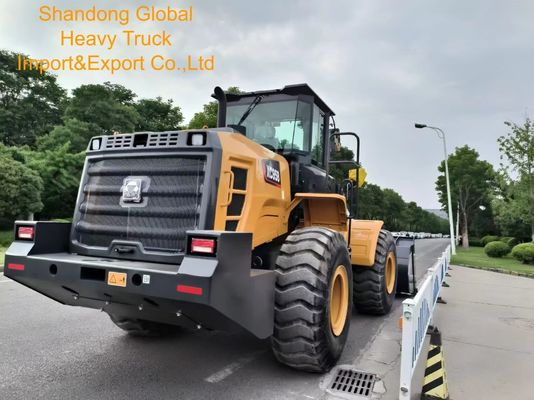 855h 5ton τροχοφόρος με 3m3 κουβά με συνημμένα στην Αφρική
