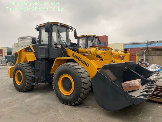855h 5ton τροχοφόρος με 3m3 κουβά με συνημμένα στην Αφρική